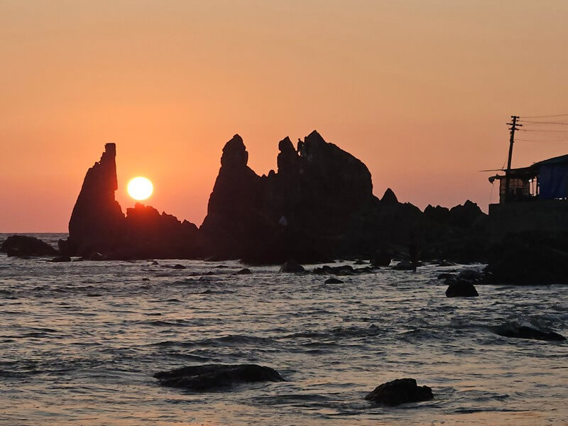 Arambol beach - Travelers exploring a natural attraction in Goa during a trip to India